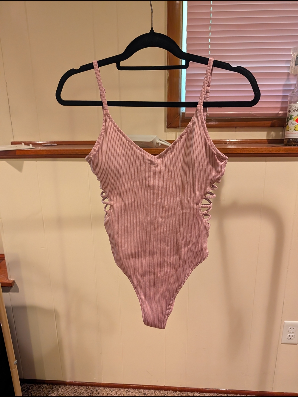 Pink Ribbed One-Piece Swimsuit with Side Cutouts